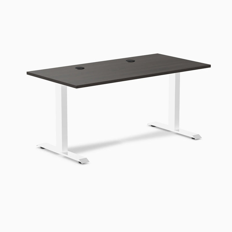 Desky Zero fixed height office desk with burnished wood laminate top, white steel frame, and two grommets.