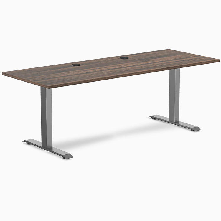 Desky Zero fixed height office desk with Jarrah Legno laminate top, Space Gray steel frame, and grommets.
