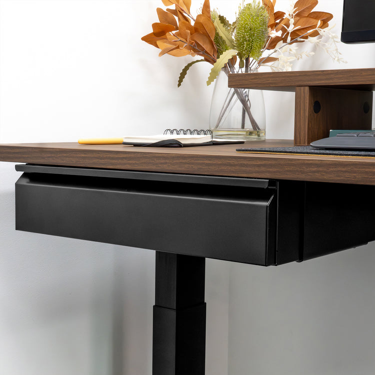 Black steel Desky Under Desk Drawer mounted beneath a dark wood desk.