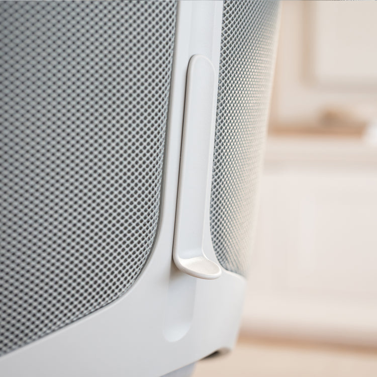 Close-up of the Desky Pinnacle Executive Office Chair's light gray mesh backrest with a white lumbar adjustment lever.