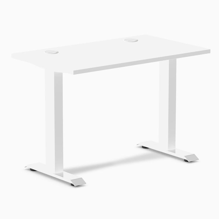 White Desky Zero Mini fixed-height desk, 40x24 inches, with two grommets for cable management.