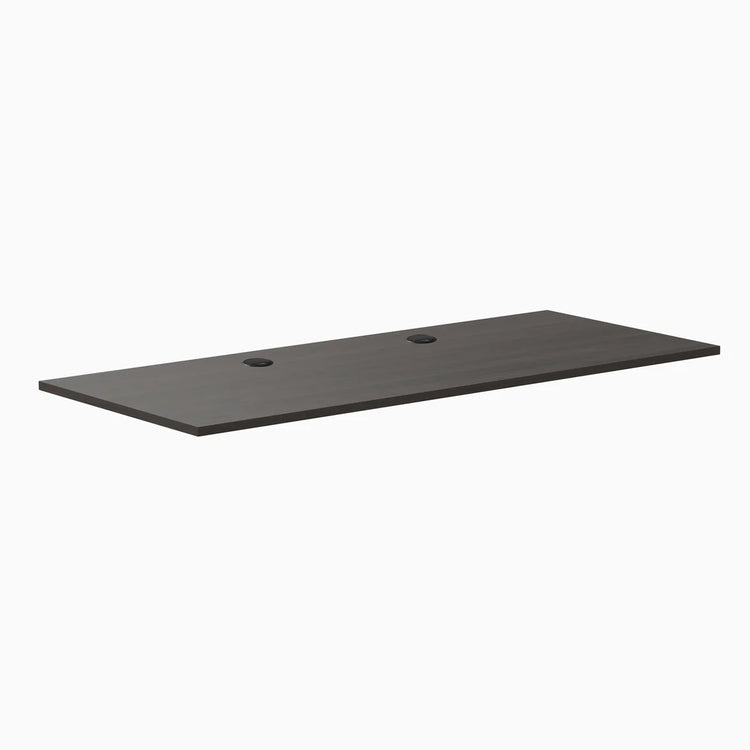 Burnished Wood laminate desktop, 70.9" x 29.5", with two black grommets.