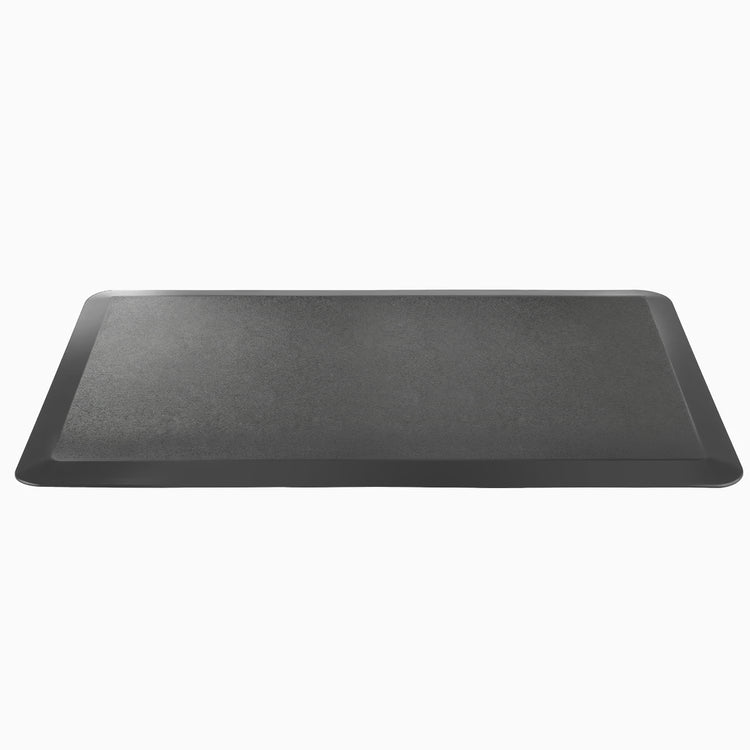 Black rectangular anti-fatigue standing mat with a rugged polyurethane foam surface and bevelled edges.