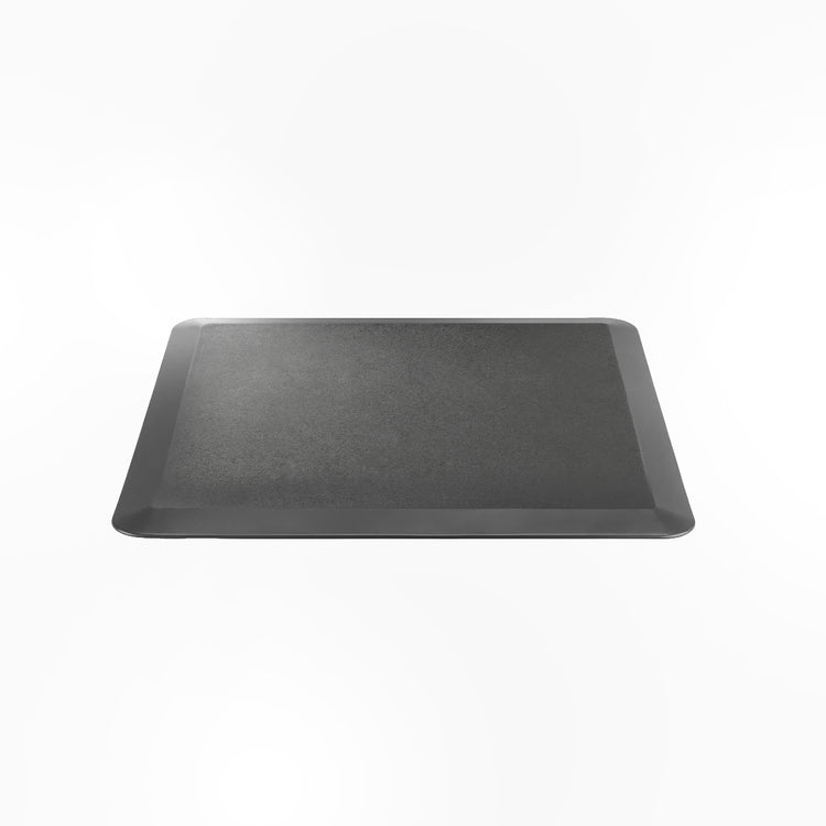 Black Desky anti-fatigue rectangle standing mat with a rugged surface and bevelled edges.