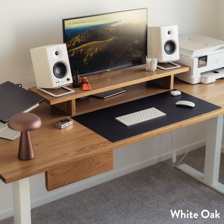 White Oak Desky Dual Hardwood Standing Desk with integrated drawer and monitor riser.