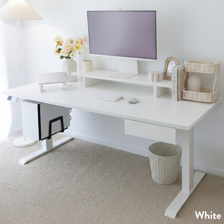 White Desky Dual Laminate Sit Stand Desk with monitor, keyboard, and accessories in a bright office.
