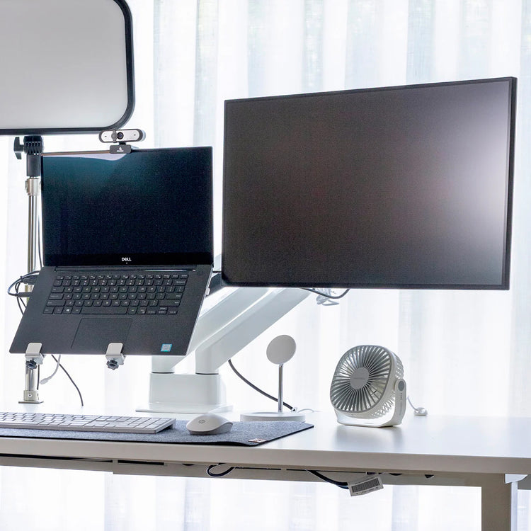Dual monitor arm set up