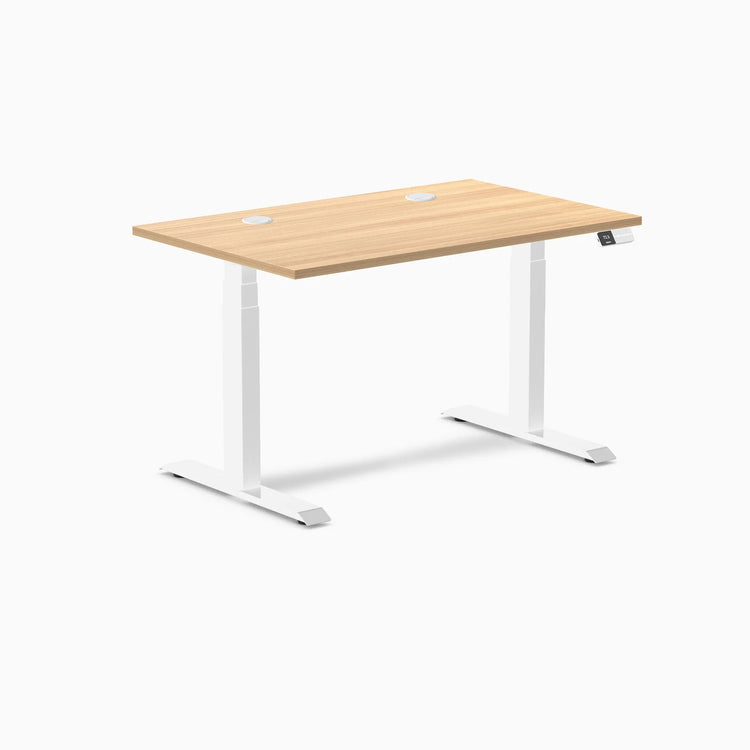 Desky Dual sit-stand desk with Sublime Teak laminate top, white frame, and two grommets.