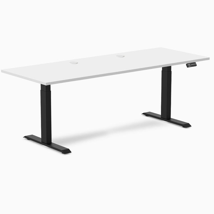 White Desky Dual Laminate sit-stand desk, 78.7x29.5 inches, with grommets and matte black frame.