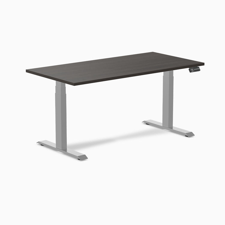 Dark laminate Desky Dual sit-stand desk with silver frame and digital control panel.
