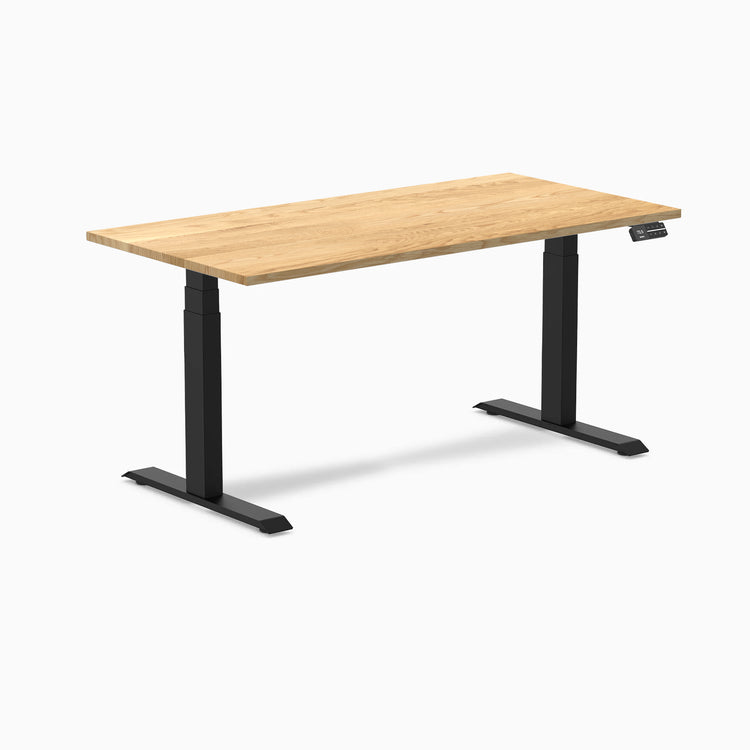 Desky Dual 60x30 inch White Oak hardwood sit-stand desk with matte black legs and control panel.