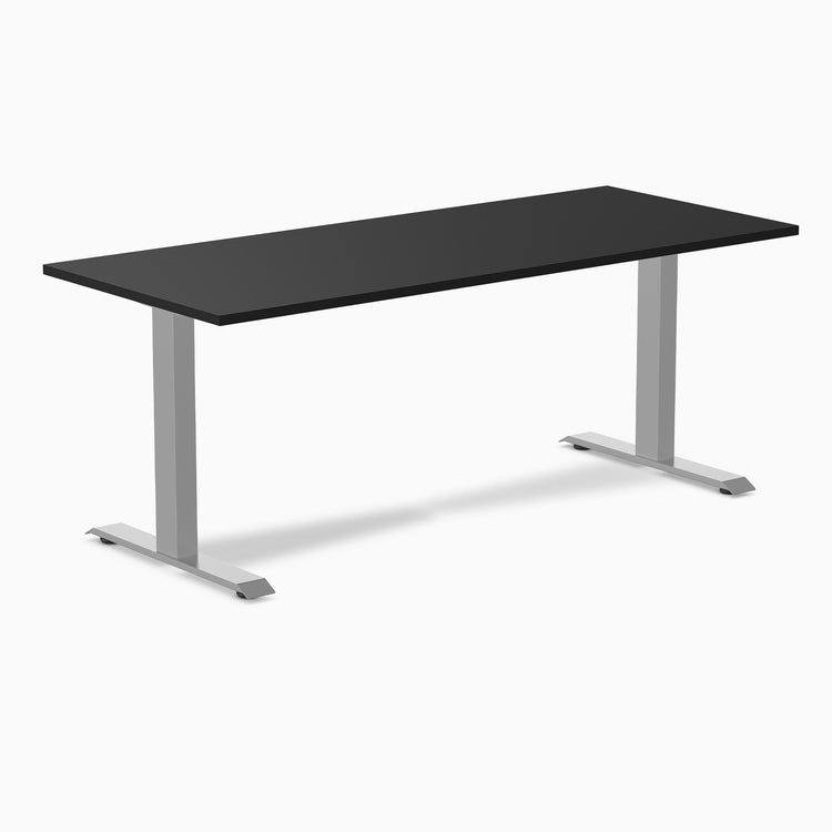 Desky Zero fixed height office desk with a black laminate top and silver steel frame.