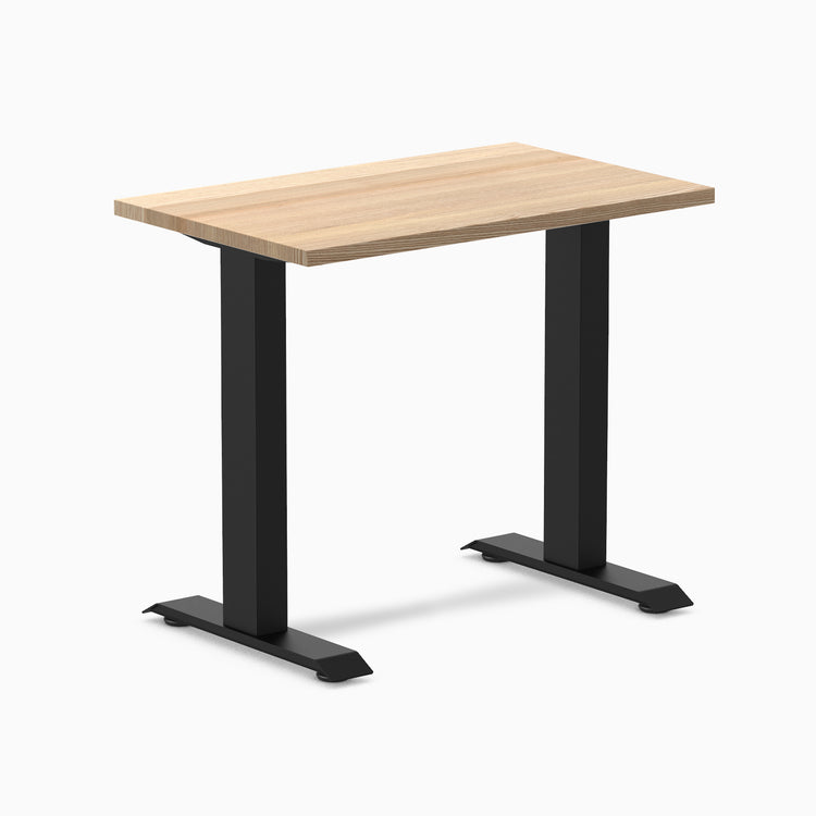 Desky Zero Mini hardwood desk with a light White Ash top and matte black steel frame.