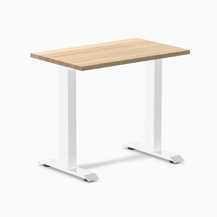 Desky Zero Mini hardwood desk with a light White Ash top and white steel frame.