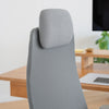 Close-up of the Desky Pinnacle Executive Office Chair's grey mesh backrest and adjustable headrest.