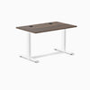 Desky Zero fixed-height office desk with Jarrah Legno laminate top, white steel frame, and grommets.