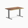 Desky Zero fixed-height office desk with a Saman hardwood top and Space Gray steel frame.