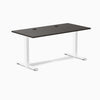 Desky Zero fixed height office desk with burnished wood laminate top, white steel frame, and two grommets.