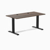 Desky Zero fixed height office desk with Jarrah Legno laminate top, matte black steel frame, and grommets.