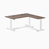 Desky L-Shape Laminate Sit Stand Desk with Jarrah Legno top, white legs, and grommets.