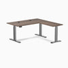 Desky L-Shape Laminate Sit Stand Desk in Jarrah Legno with Space Gray legs and grommets.