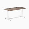 Desky Zero fixed height office desk with natural walnut laminate top, white steel frame, and two grommets.