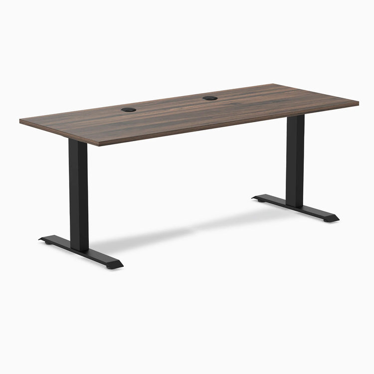 Desky Zero fixed-height office desk with Jarrah Legno laminate top, black steel frame, and two grommets.