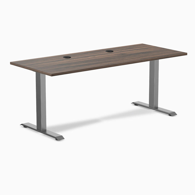 Desky Zero fixed height office desk with Jarrah Legno laminate top, Space Gray steel frame, and two grommets.