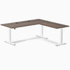 Desky L-Shape Laminate Sit Stand Desk in Jarrah Legno with white legs and grommets.