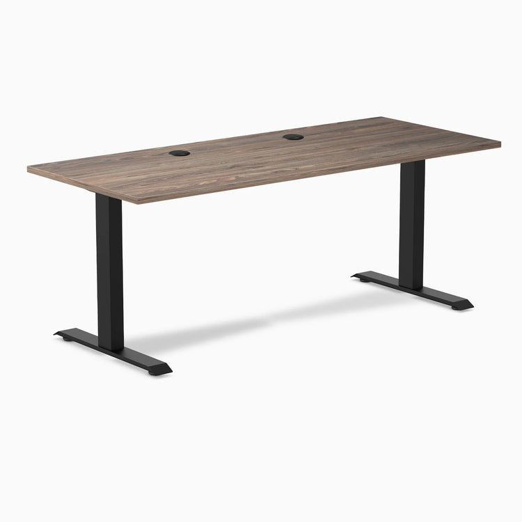 Desky Zero laminate office desk, natural walnut 70.9x29.5 inch top with grommets, matte black steel frame.