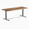 Desky Zero 72x30 inch Saman hardwood desk with live edge and Space Gray steel frame.
