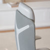 Close-up of the Desky Pinnacle Executive Office Chair's grey mesh backrest and white headrest.