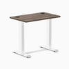Desky Zero Mini fixed-height desk with Jarrah Legno top, white legs, 32x20 inches, and grommets.