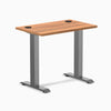 Desky Zero Mini office desk, Prime Oak 32x20 inch top with grommets, Space Gray fixed-height legs.