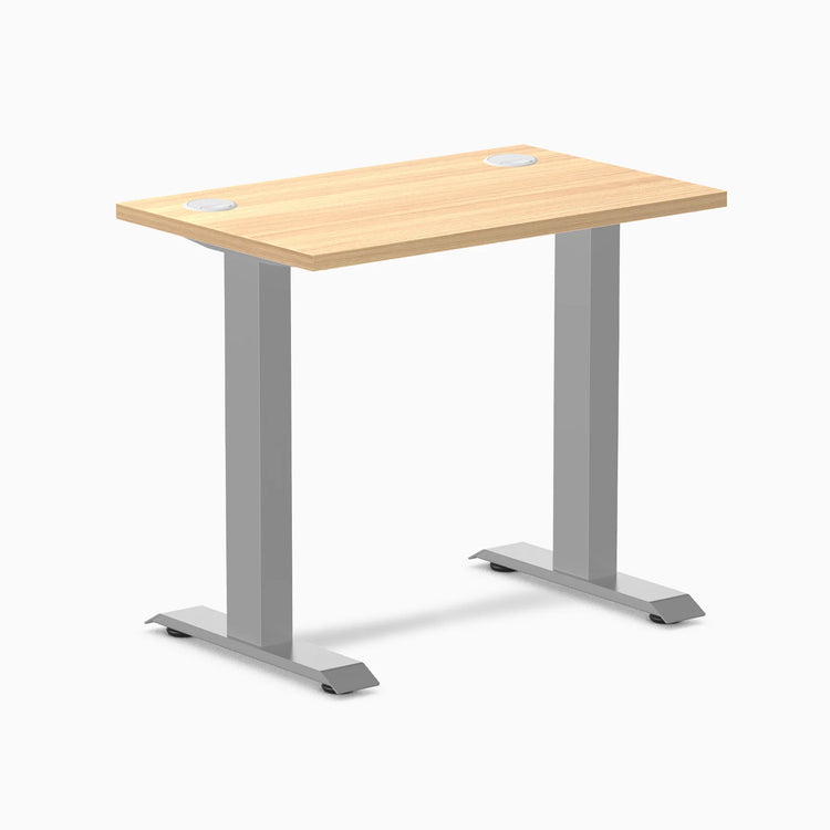 Desky Zero Mini sit-stand desk, Sublime Teak 32x20 inch top with grommets, gray legs.