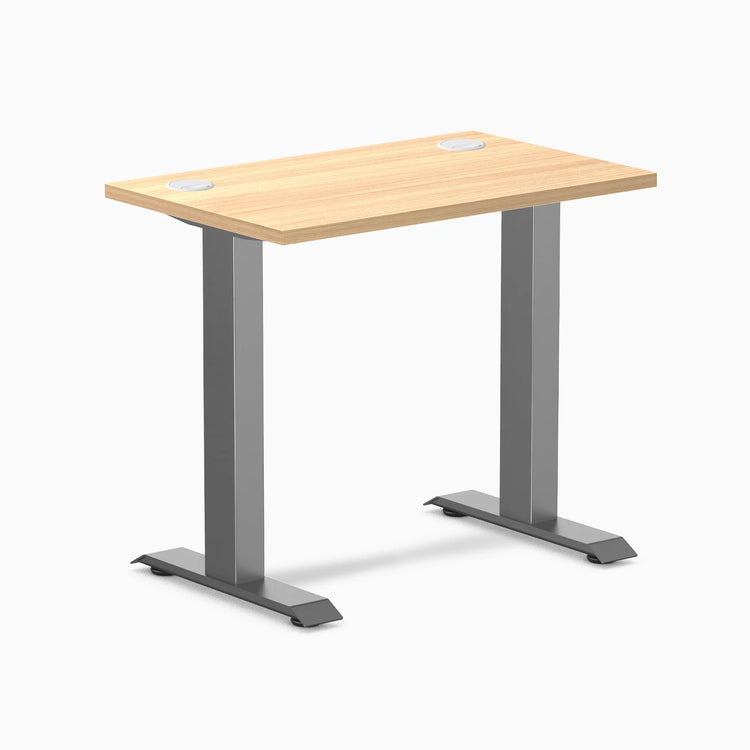 Desky Zero Mini sit-stand desk with Sublime Teak top, Space Gray legs, and grommets.