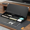 Black Desky Desktop Whiteboard with open lid, showing organized compartments for pens, AirPods, and notes.