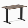 Desky Zero Mini sit-stand desk, Jarrah Legno 40x24 inch top with grommets, matte black legs.