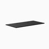 Desky 59.1" x 29.5" black laminate desktop with two grommets, 1" thick.