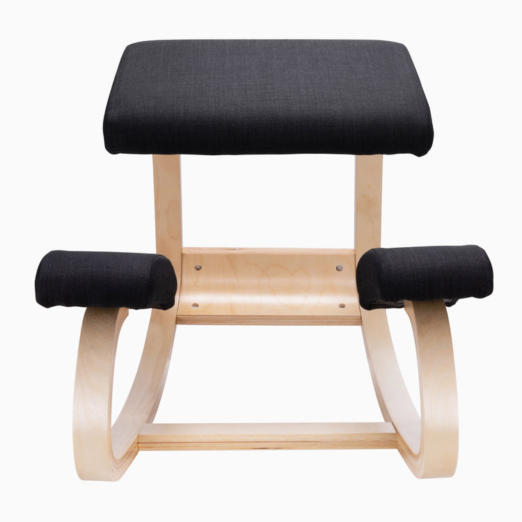 Desky Kneeling Chair with light beechwood frame and black mesh cushions.
