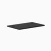 Desky Mini 32x20 inch black melamine laminate desktop with two grommets.