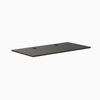 Desky Burnished Wood laminate desktop, 59.1" x 29.5", with two grommets for cable management.