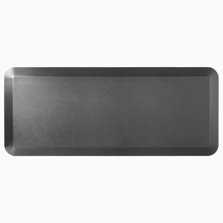 Black Desky anti-fatigue rectangle standing mat with a rugged surface and bevelled edges.