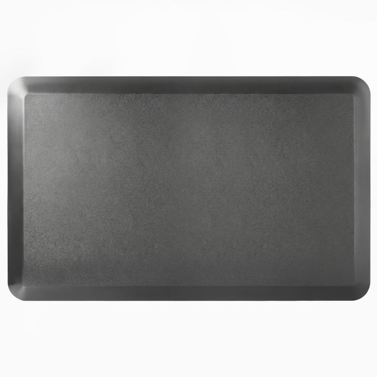 Black rectangular anti-fatigue standing mat with a rugged surface and bevelled edges.