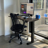 Desky Dual Mini Sit Stand Desk - naturaal walnut in use