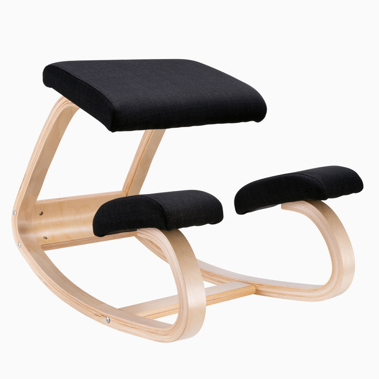 Desky Kneeling Chair with light beechwood frame and black mesh cushions.