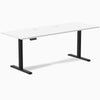 Desky Single Sit Stand Desk with white 78.7x29.5 inch top, black frame, and grommets.