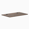 Desky Mini Laminate Desktop in Jarrah Legno, 40x24 inches, with two black grommets.
