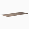 Desky Natural Walnut laminate desktop, 70.9" x 29.5", with two black grommets.