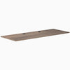 Desky Natural Walnut laminate desktop, 78.7 x 29.5 inches, with two grommets for cable management.